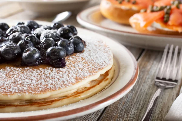 View Plate Pancakes Topped Blueberries Plate Bagel Lox Background — Stock Photo, Image