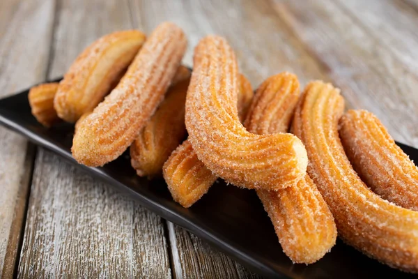 Uma Vista Uma Chapa Pedaços Churro — Fotografia de Stock