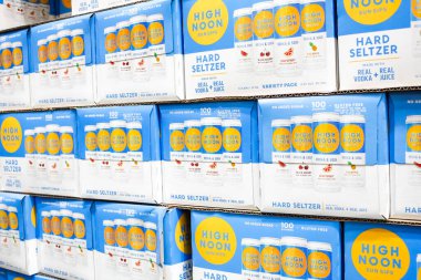 Tustin, California/United States - 02/08/2020: A view of several cases of High Noon hard seltzer cans on display at a local big box grocery store.