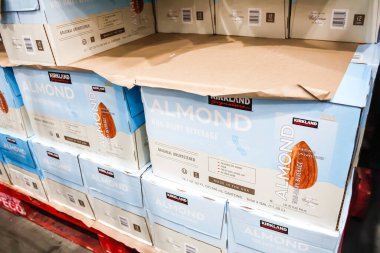 Tustin, California/United States - 02/08/2020: A view of several cases of Kirkland Signature Almond non-dairy beverage on display at a local Costco.