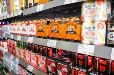 West Covina, California/United States - 02/19/2020: A view of several shelves dedicated to ginger beer products, on display at a local grocery store.