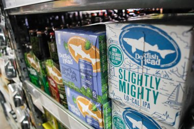 West Covina, California/United States - 02/19/2020: A view of several cases of Dogfish Head beer on display at a local grocery store.