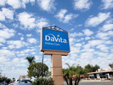 Orange, California, United States - 03-16-2020: A street side sign for the DaVita Kidney care clinic.