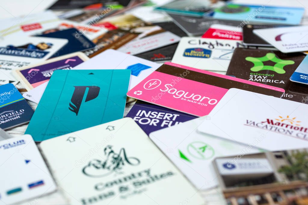 Garden Grove, California/United States - 02/06/2020: A closeup view of a background of several brands of hotel magnetic strip key cards.