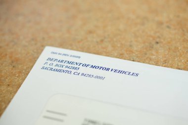 Los Angeles, California, United States - 05-05-2020: A closeup view of an envelope from the Department or Motor Vehicles.