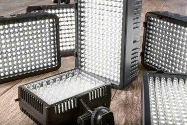 A closeup view of several LED video camera mount lights.