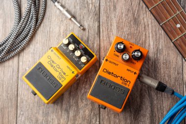 Los Angeles, California, United States - 05-07-2020: A top down view of several Boss guitar effects pedals, in a still life setting.