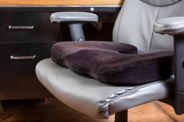 A view of a seat cushion on an office chair. clipart
