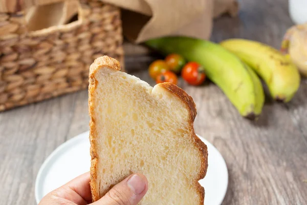 View Hand Holding Slice Sourdough Bread Still Life Setting — Foto de Stock