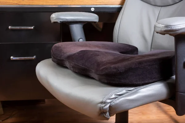 A view of a seat cushion on an office chair.