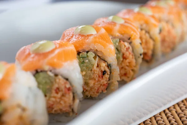 Closeup View Middle Portion Orange Dragon Roll Sushi Plate — Stock fotografie