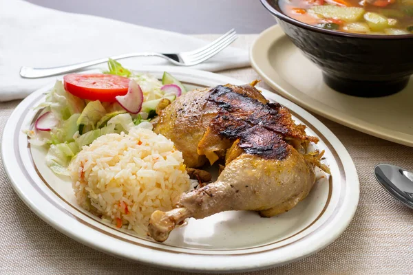 A view of a Latin American dish called arroz con pollo, or rice and chicken,