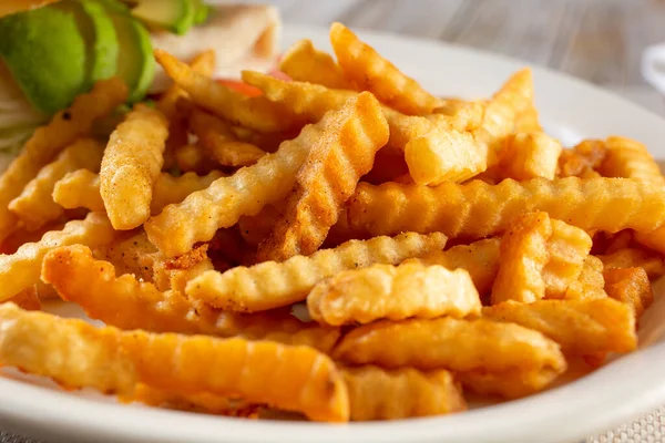 Closeup View Plate Crinkle Cut French Fries —  Fotos de Stock