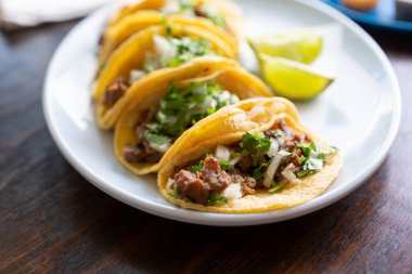 A view of a platter of street tacos.