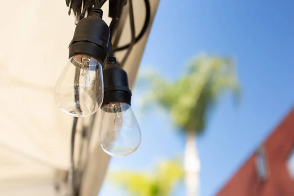 Closeup View Hanging Retro Style Lightbulbs — стоковое фото