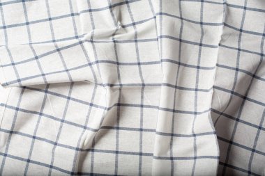 Arka plan olarak kırışık bir mutfak havlusu görüntüsü..