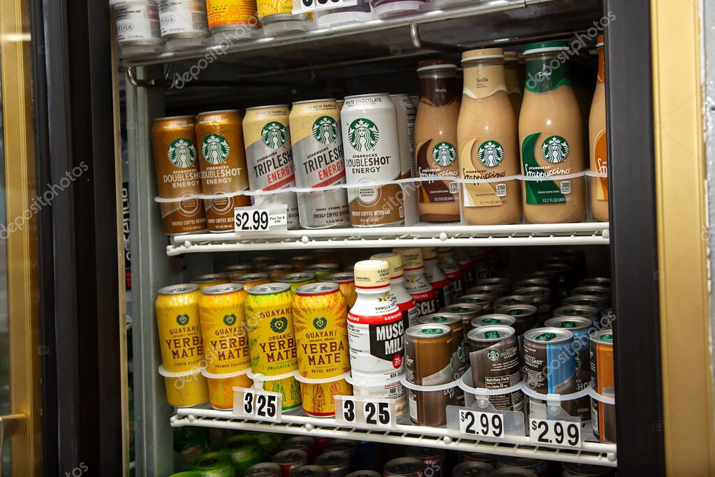 Los Angeles, California, United States - 07-22-2020: A view of a commercial beverage refrigerator filled with a variety of popular energy and coffee drinks, seen at a local liquor store.