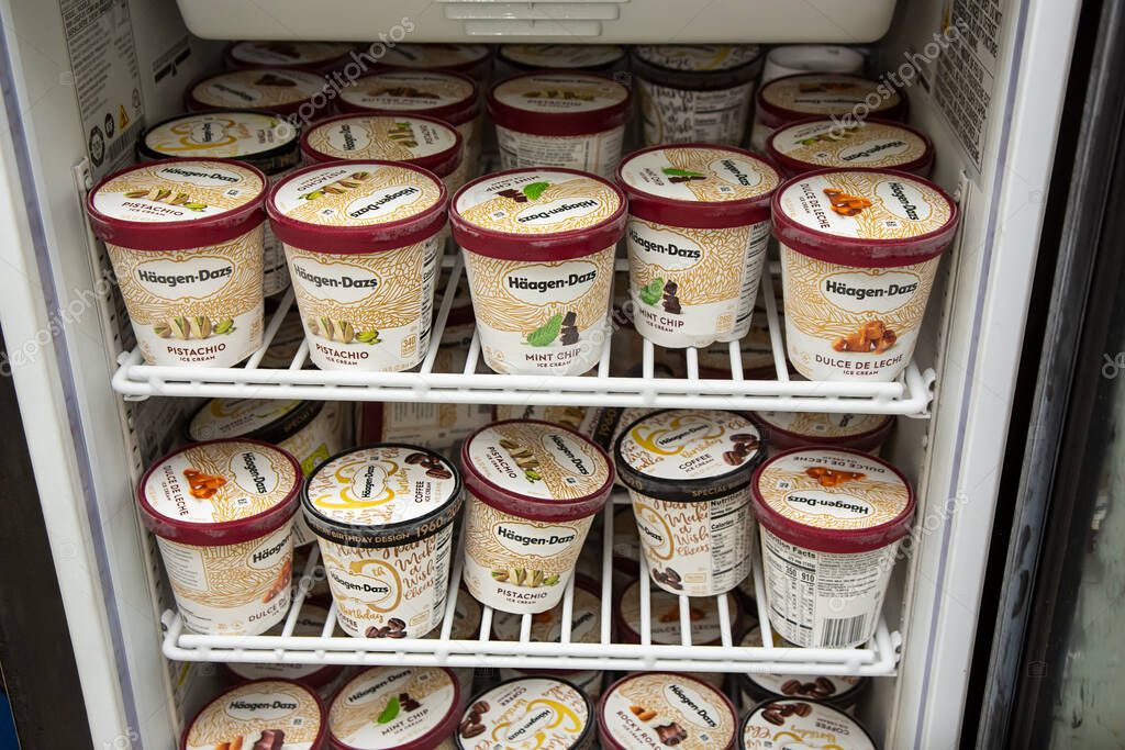 Los Angeles, California/United States - 07/22/2020: A view of a small commercial refrigerator filled with a variety of Haagen-Dazs ice cream flavors, seen at a local convenient store.