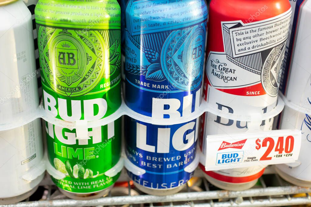 Los Angeles, California/United States - 07/22/2020: A view of several Budweiser tall can products, seen inside a commercial beverage refrigerator at a local liquor store.
