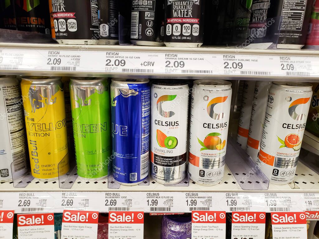 Los Angeles, California/United States - 07/22/2020: A view of several brands of energy drink cans, on display at a local grocery store.