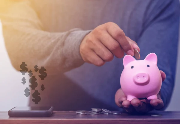 Save money and account banking for finance concept, Piggy bank with coin on blurred background, Save Monney for Investors Using Internet to Trade Stocks or Trade Fund