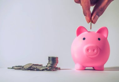 Save money and account banking for finance concept, Piggy bank with coin on blurred background, Save Monney for Investors Using Internet to Trade Stocks or Trade Fund, Vintage style
