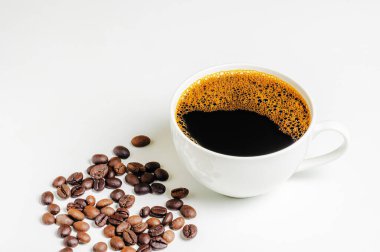 A cup of coffee with coffee bean on white background