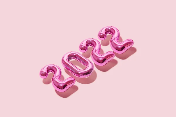 Nieuwjaar 2022 Roze Aluminiumfolie Ballonnen Zweven Vliegen Poeder Roze Achtergrond — Stockfoto
