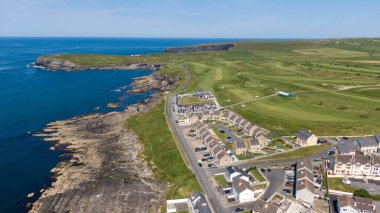 Kilkee town and public beach and surrounding cliffs around the crystal blue Atlantic, Kilkee, Ireland, August,13,2022