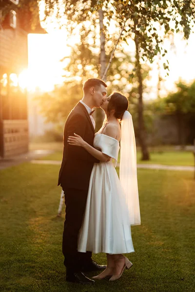 Young Couple Groom Black Suit Bride White Short Dress Walk — Photo