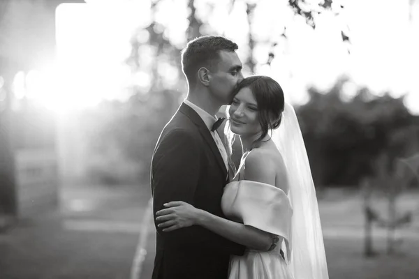 Young Couple Groom Black Suit Bride White Short Dress Walk — Stockfoto