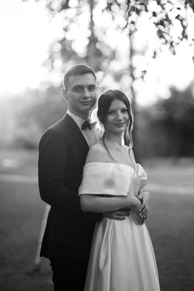 Young Couple Groom Black Suit Bride White Short Dress Walk — Fotografia de Stock