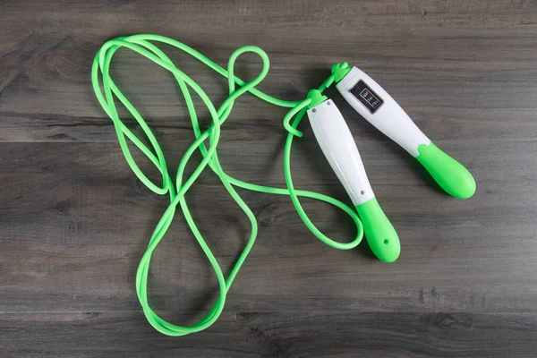 Green Skipping Rope Training Wooden Table — Stock Photo, Image