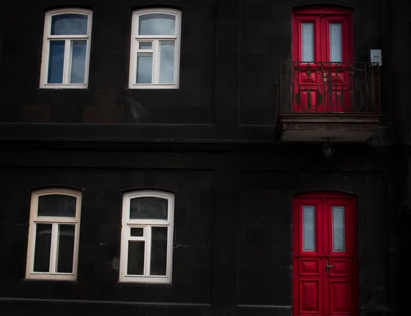 Black House Red Door White Window — Stock Photo, Image