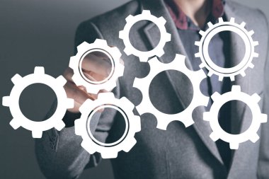 Vites mekanizması. Ekranda tıklayan adam