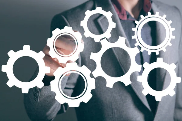 Vites mekanizması. Ekranda tıklayan adam