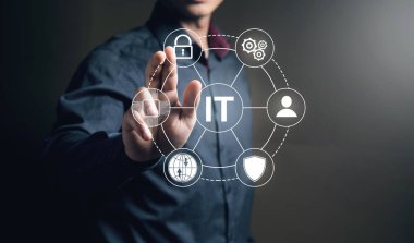 IT technology icons in a circle. Man tapping on the screen