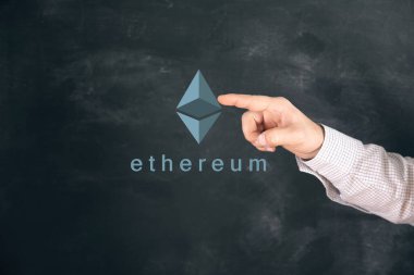 Ethereum virtual currency image. Cryptocurrency. Man tapping on the screen