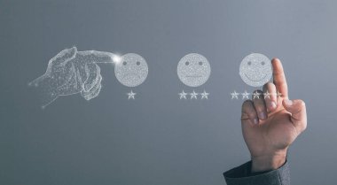 Stars and emoticons for evaluation from the web. Man tapping on the screen