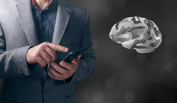 Human brain from the network. Man hold phone in hand