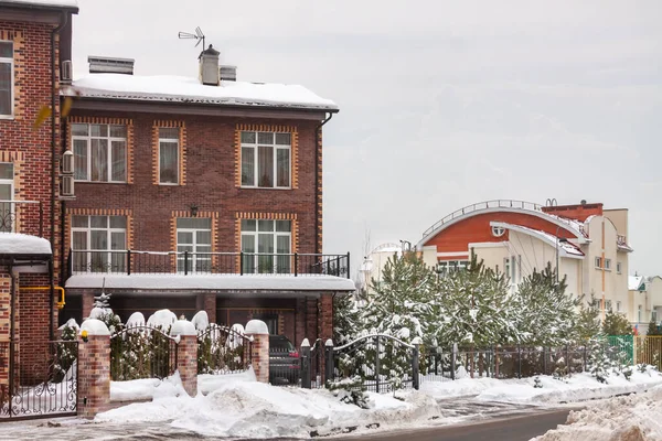 Winter house building exterior mixed-use urban multi-family residential district area development — Stock Photo, Image