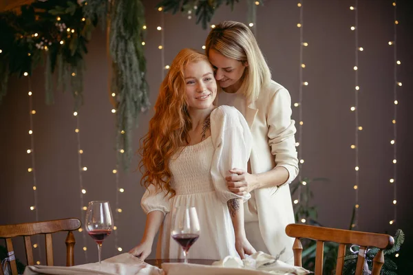 Lesbian Couple Having Dinner Restaurant One Girl Hugs Her Beloved Stockbild