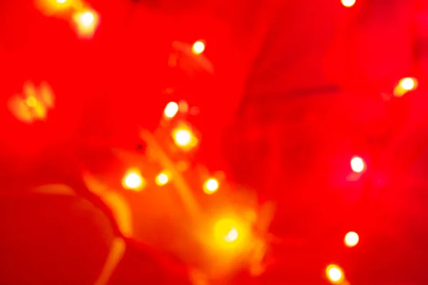 圣诞花环 背景闪亮的模糊的Bokeh 五彩斑斓的火花在一个黑色的背景 软焦点 — 图库照片