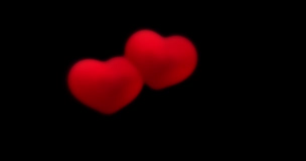 Red hearts on a black background. valentines day, love, like, anniversary holiday, mothers day, march 8, womens day wedding, invitation e-card. 4k video footage. blend mode — Stock Video