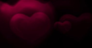 Siyah arka planda kırmızı kalpler. Sevgililer günü, aşk, yıldönümü tatili, anneler günü, 8 Mart, kadınlar günü düğünü, davetiye kartı. 4K video kaydı. Harmanlama kipi