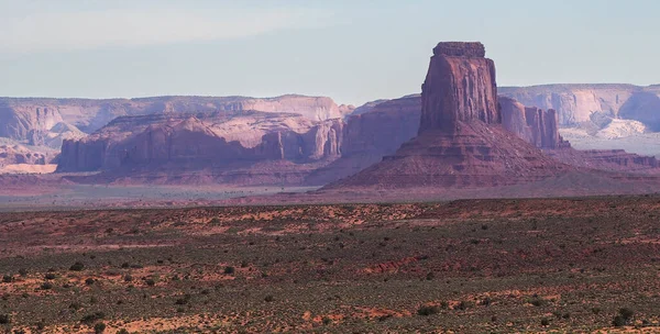 Rock formation in the desert of Monument Valley, Arizona, USA. Navajo nation area in American southwest. Famous rock formations in Arizona desert. Red sandstone mesa