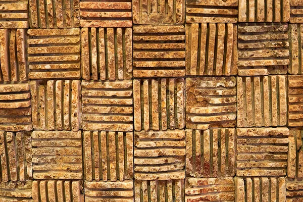 Doğal hacim taşından yapılmış güzel kahverengi hacimli arka plan. Yüksek kalite fotoğraf