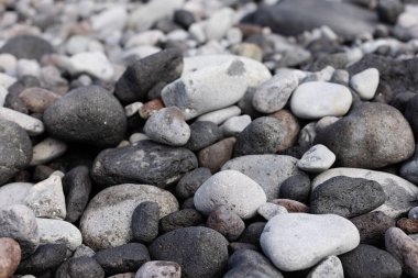 Çıplak taşlı deniz kenarının dokusu. Doğal arkaplan