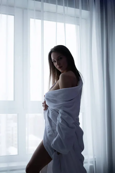 Side View Tempting Nude Female Bathrobe Touching Breast While Standing — стоковое фото