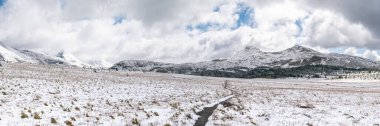 Freshly snowed mountains pass with path leading through it, pano, Mt Assiniboine Provincial, Canada
